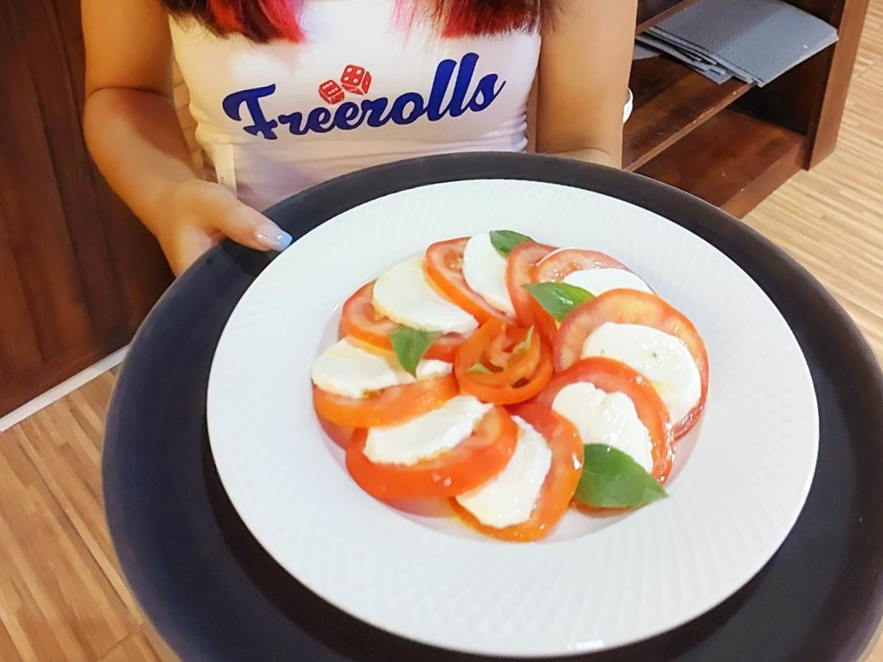 caprese salad being served