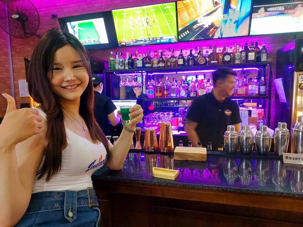 Indulge in cocktails at The Riverside Bar
